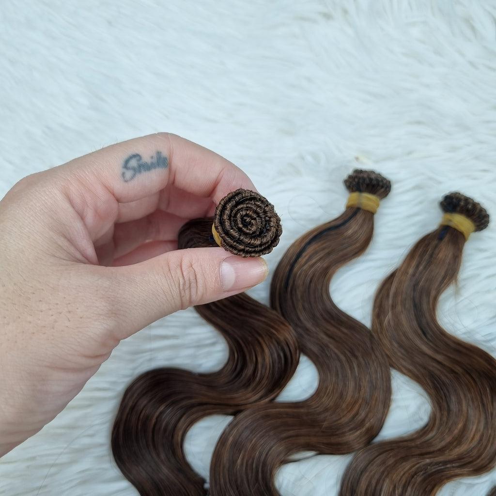 REMY HUMAN HAIR EXTENSIONS