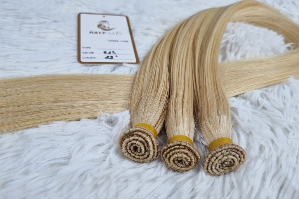 Weave hair extensions medium blonde color