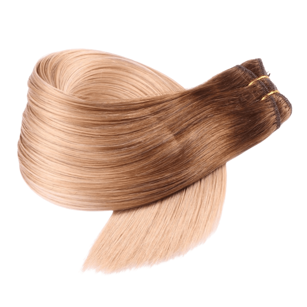 Weft extensions medium blonde color hair